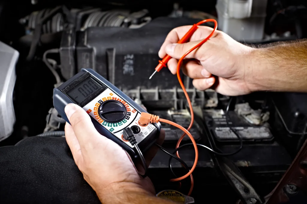 man holding electrical tools